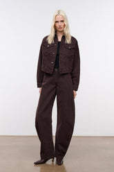 Dark brown denim jacket, button-up front, shoulder seams, flap chest pockets