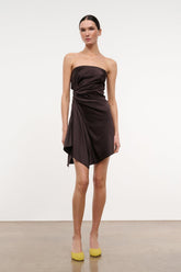 Strapless ruched satin mini dress in dark brown with draped asymmetrical hem