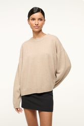 Stone relaxed cashmere crewneck sweater with dropped shoulders and ribbed hem