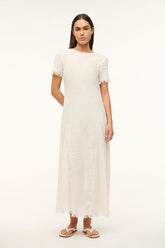 Coverup dress in buttercream with short frayed sleeves, loose fit midi length