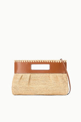 Natural tan woven straw clutch with brown leather flap and top handle.