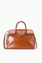 Tabac leather carryall bag with top handles, flap pockets, and adjustable shoulder strap