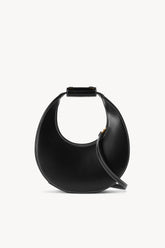 Black mini moon bag with top handle and side strap