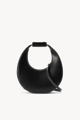 Black mini moon bag with top handle and side strap