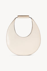 Cream crescent moon bag with top handle and stitched curved edge