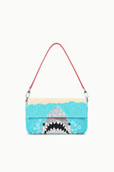 Turquoise sequin shoulder bag with red handles and shark graphic front.
