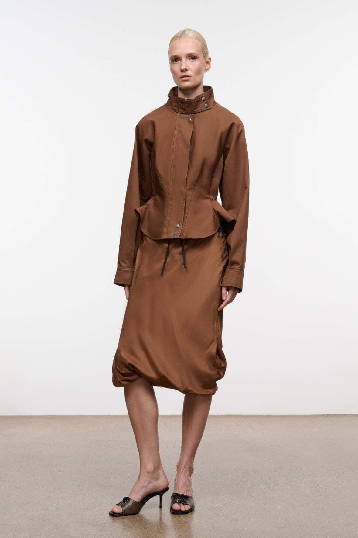 Cigar brown jacket full view with stand collar, snap front, and drawstring hem; patch pockets