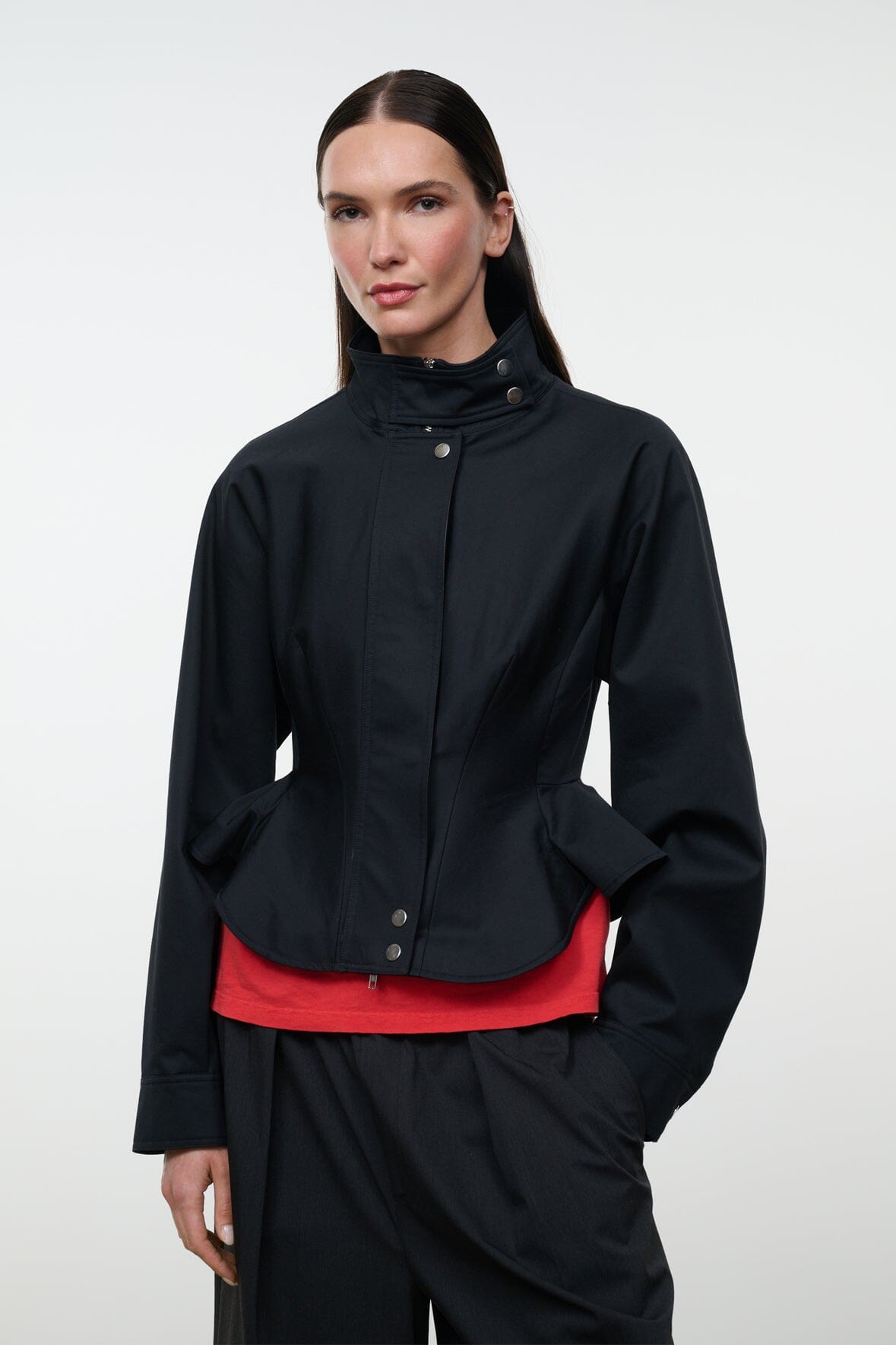 Black stand-collar jacket with snap front and peplum waist detail