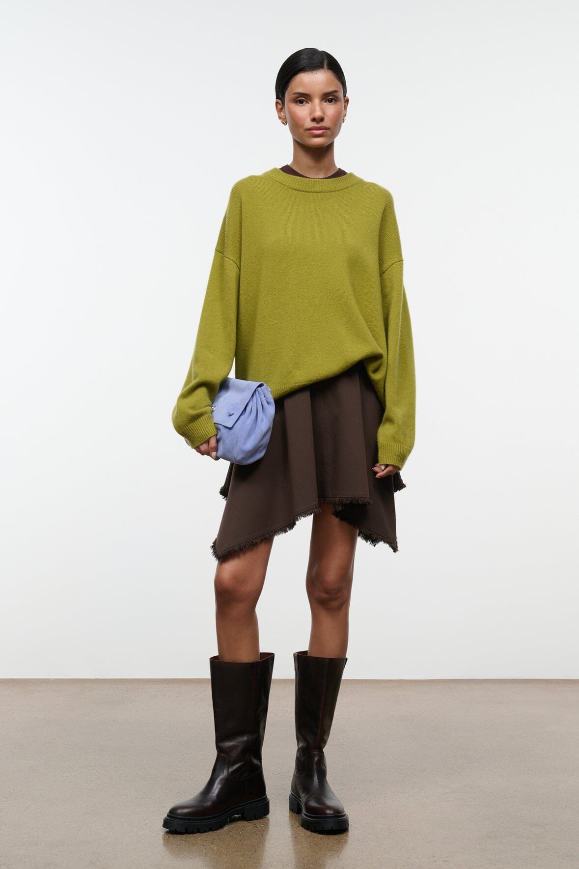 Women's Tyra skirt in dark brown with uneven hem and frayed edges