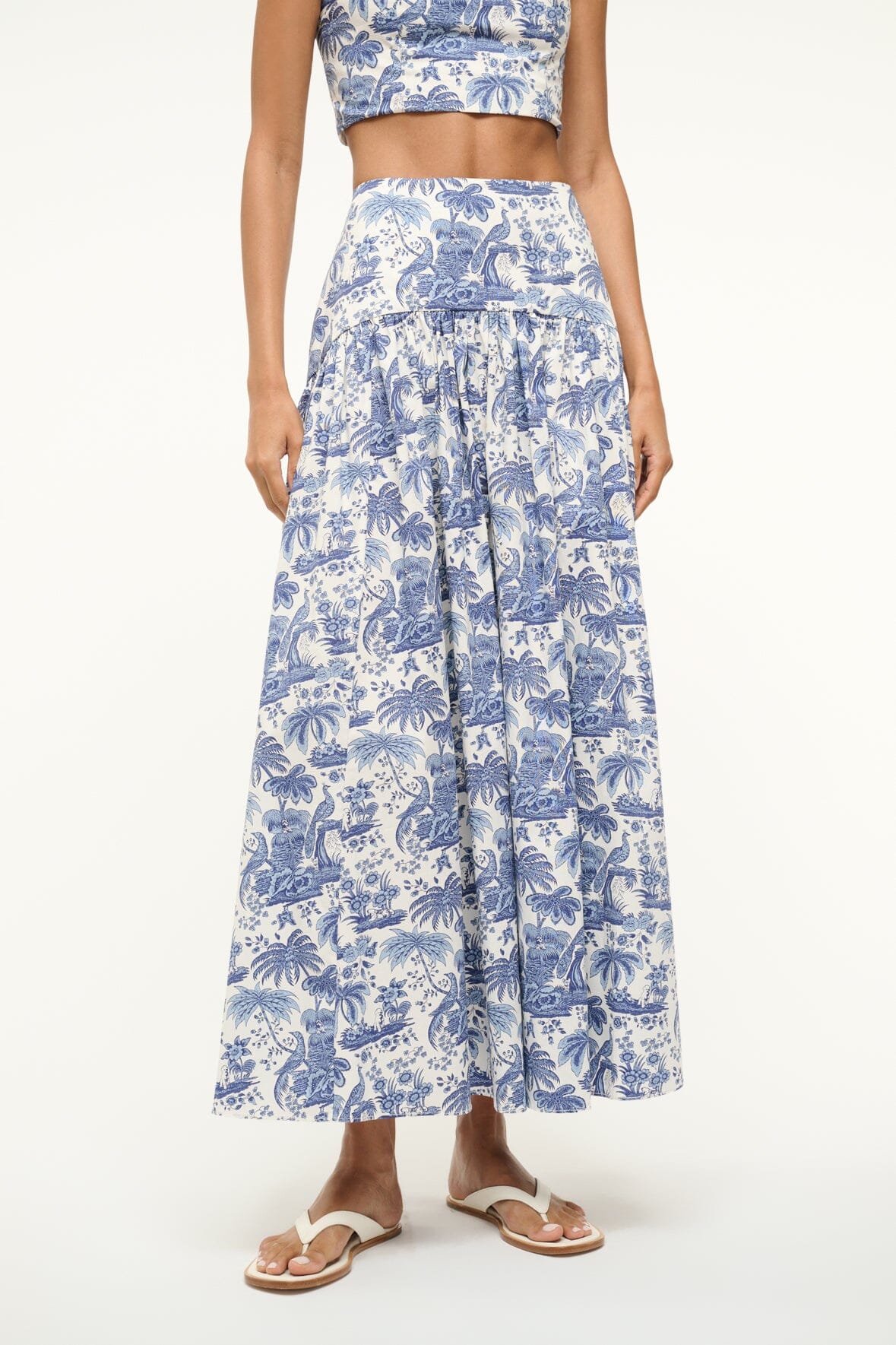Blue toile maxi skirt with elastic waist, gathered tiered panels, and full drape