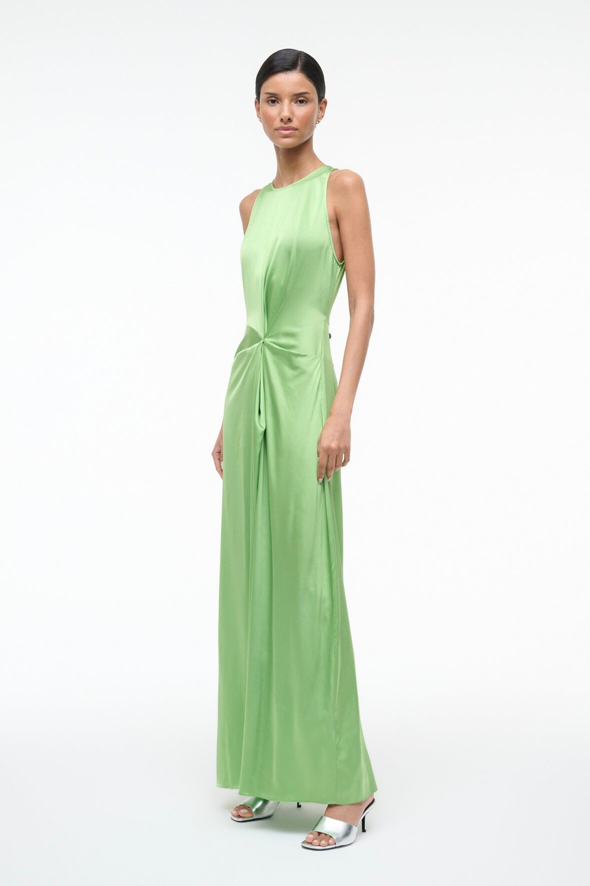 Green silk sleeveless maxi dress, front view with gathered knot detail and high neckline
