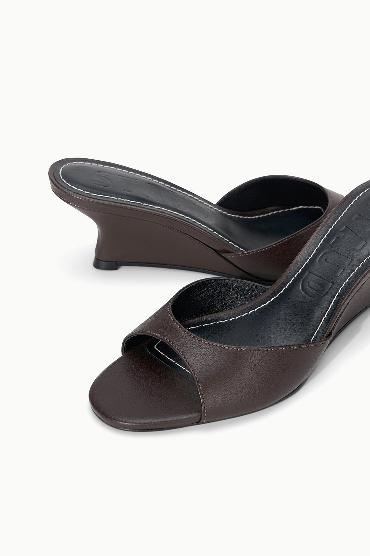 Espresso brown wedge slide sandal with open toe and dark cushioned footbed