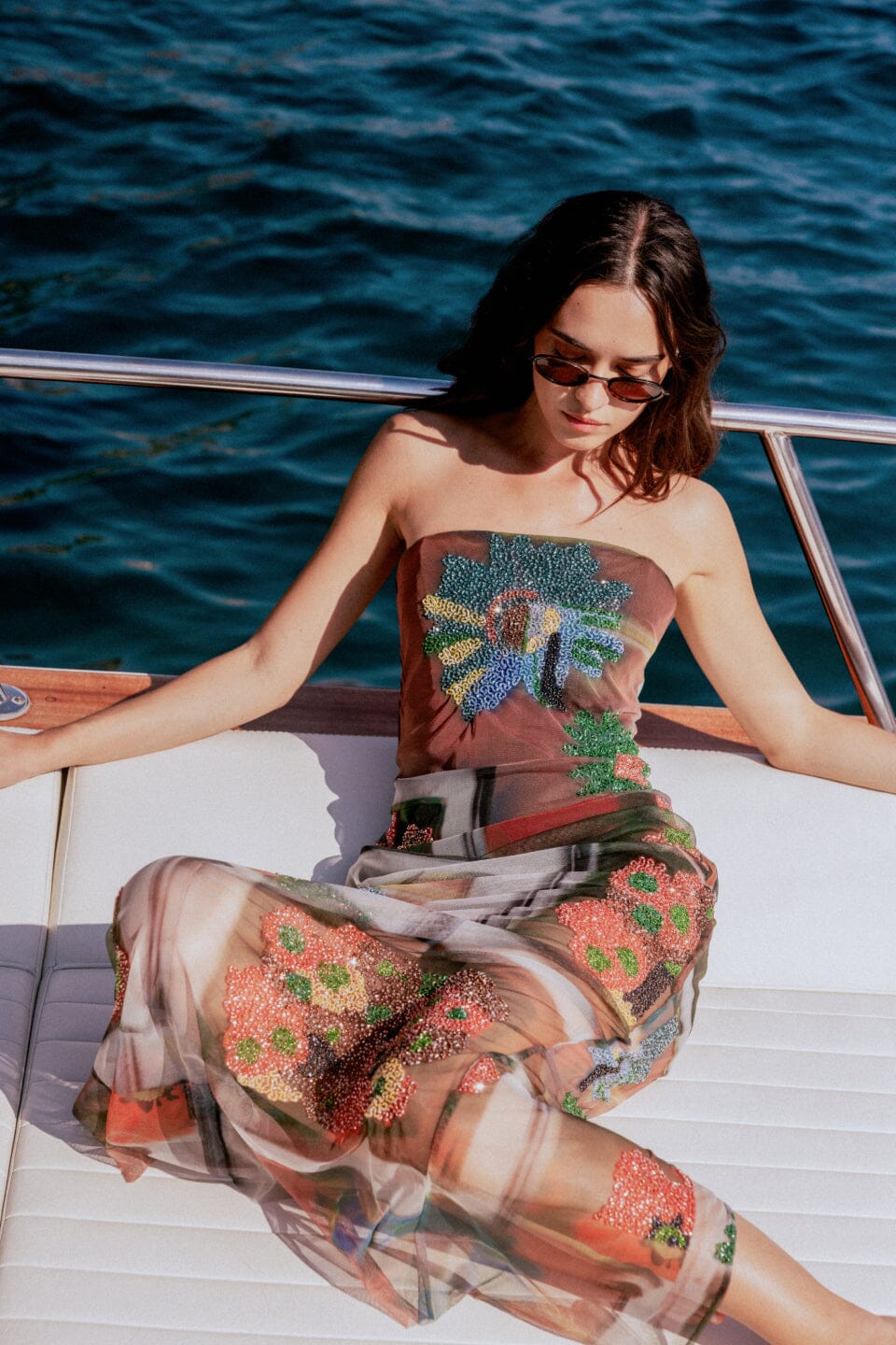 Strapless maxi dress with sheer multicolor mesh and scattered beaded floral patches