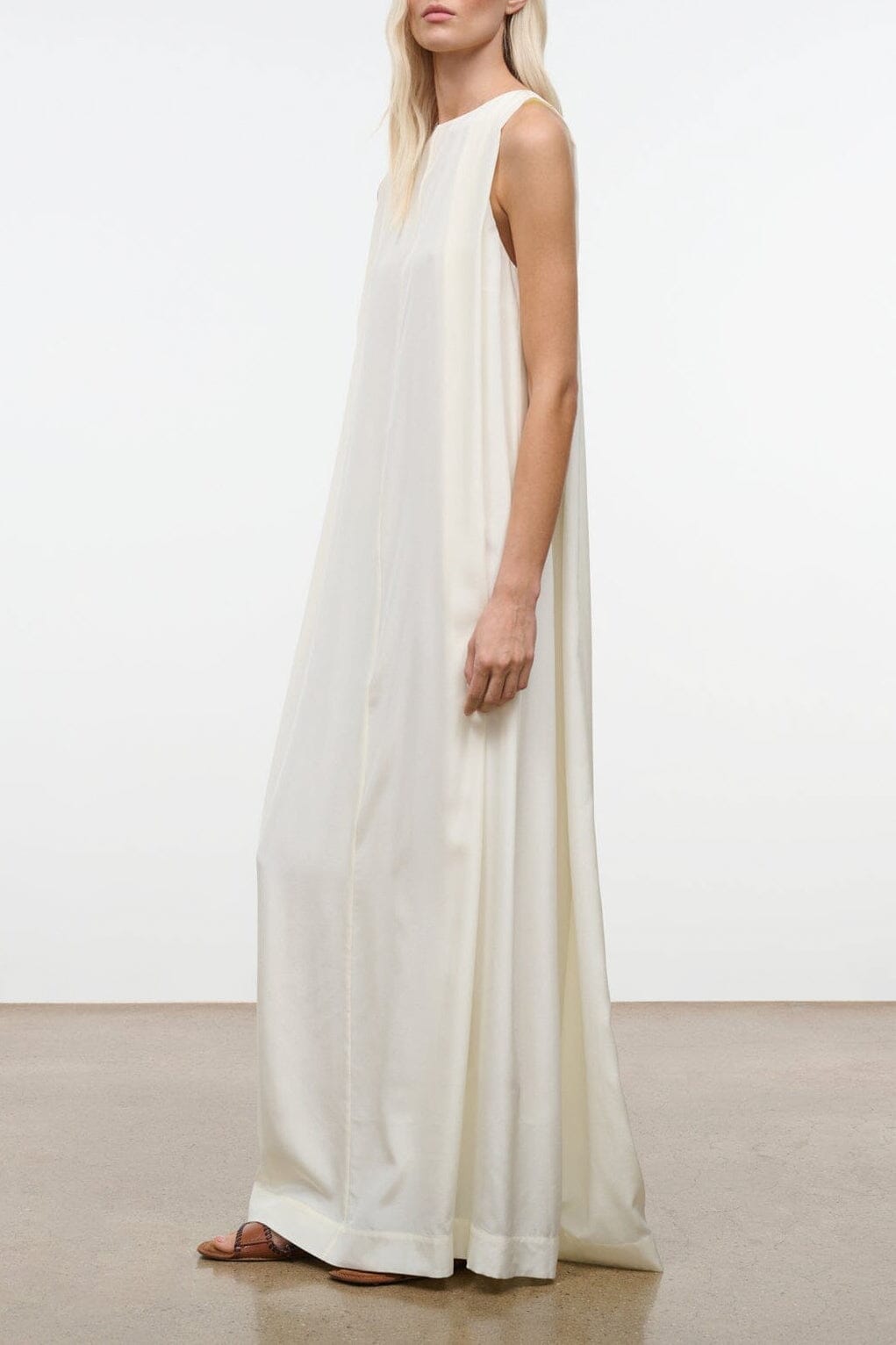 Ivory silk maxi dress, sleeveless with a flowing A-line silhouette